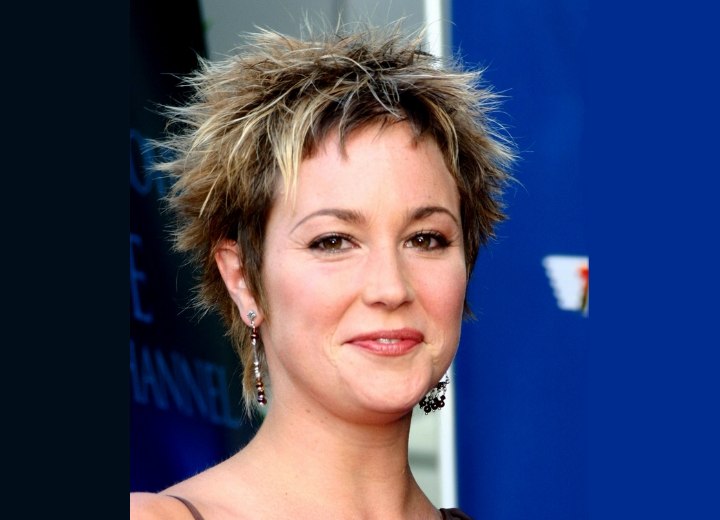Kim Rhodes with her hair in a pixie cut