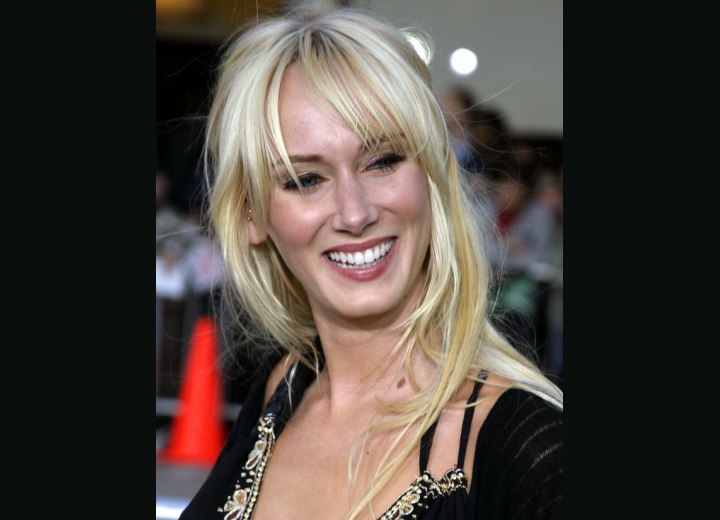 Kimberly Stewart's hair with long textured bangs