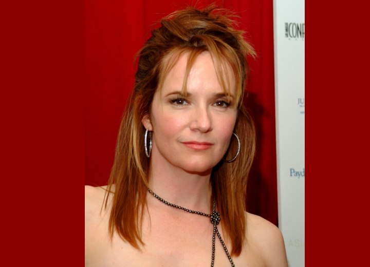 Lea Thompson's hairstyle with pieced sections