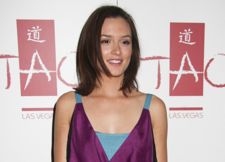 Leighton Meester wearing a silk purple dress