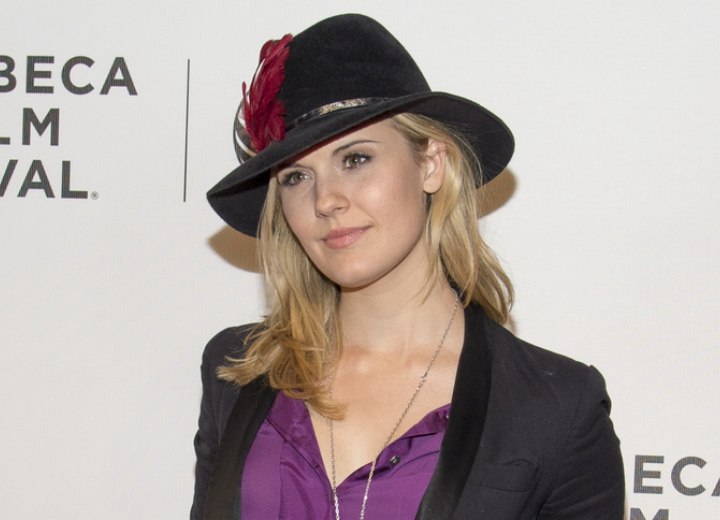 Maggie Grace wearing a hat