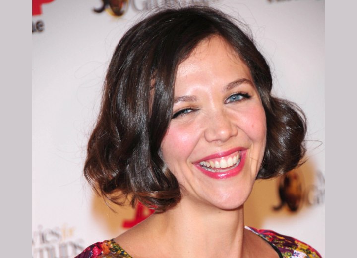 Maggie Gyllenhaal with short twenties inspired retro hair