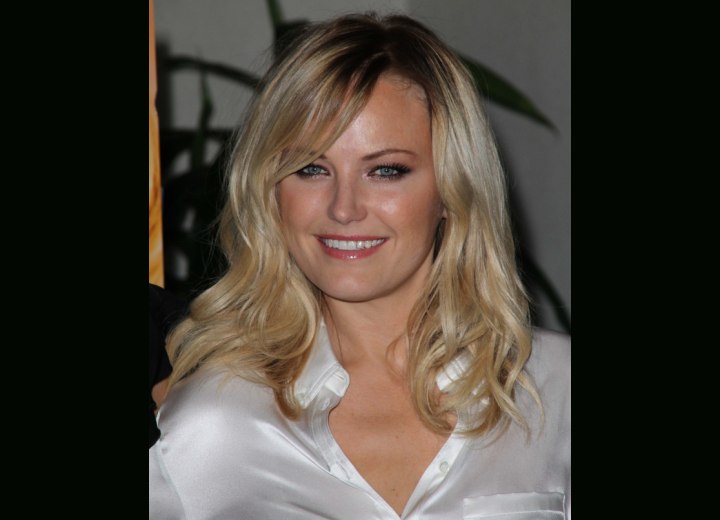 Malin Akerman's professional look with long carefree hair, side ...