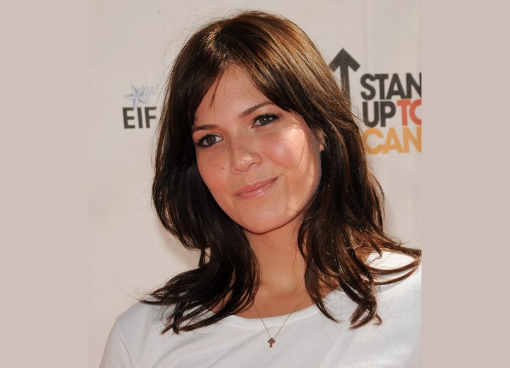 Mandy Moore with long chestnut hair in an informal style
