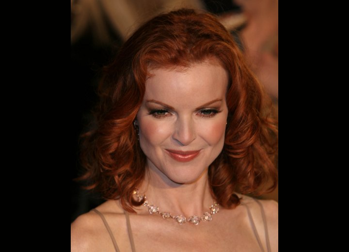 Medium-length red hair with curls - Marcia Cross