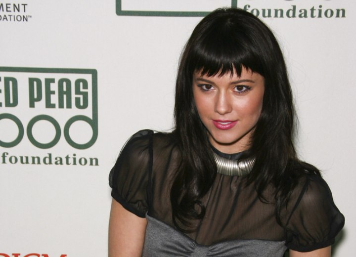 Mary Elizabeth Winstead look with a high-necked blouse