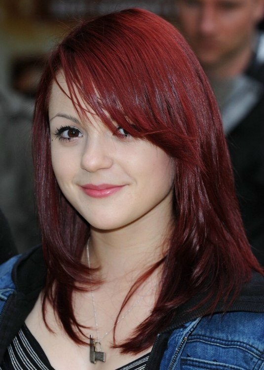 Megan Prescott's red hair with angled sides and Heather 
