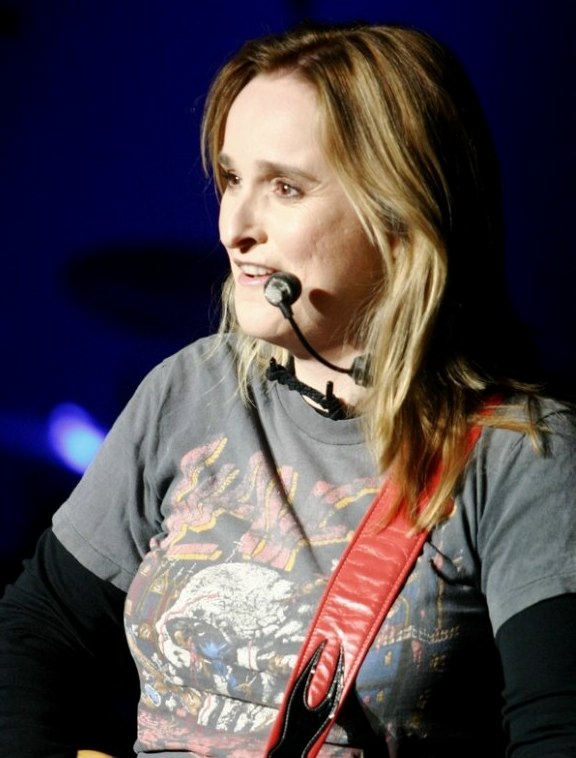 Melissa Etheridge wearing her long hair in a no fuss style