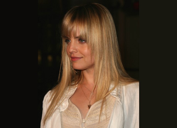 Mena Suvari with long tapered hair