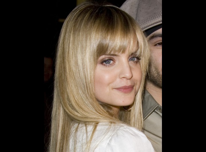 Side view of Mena Suvari's long hairstyle