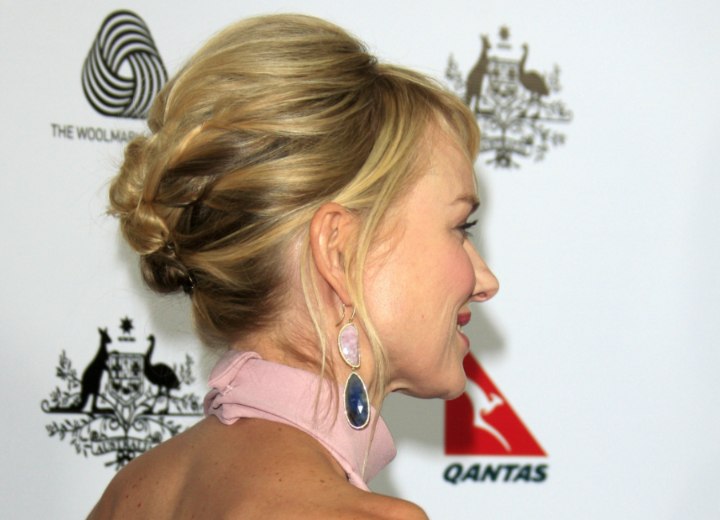 Side view of Naomi Watts updo with twisted knots