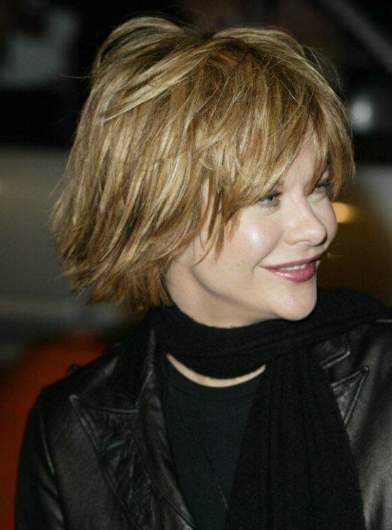 Meg Ryan wearing her hair short with layering and feathering