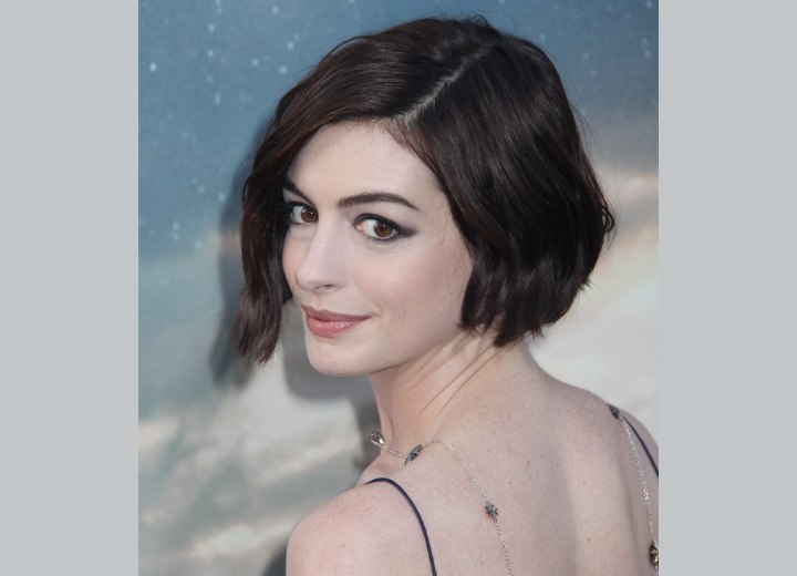 Anne Hathaway wearing her hair in a short wavy bob