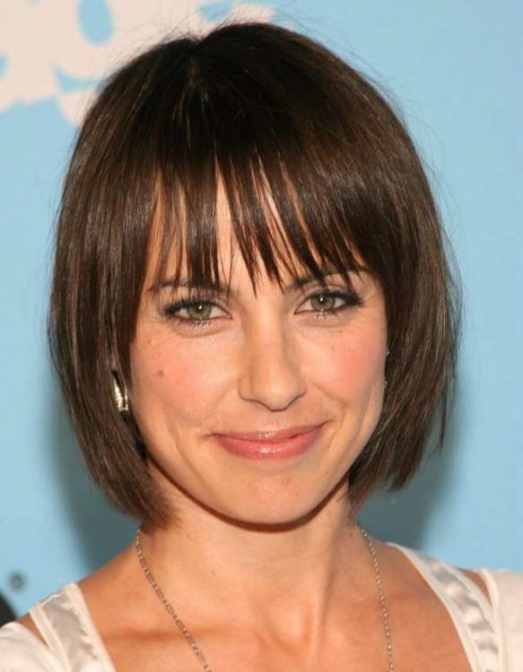 Constance Zimmer wearing her hair in a short bob with long 