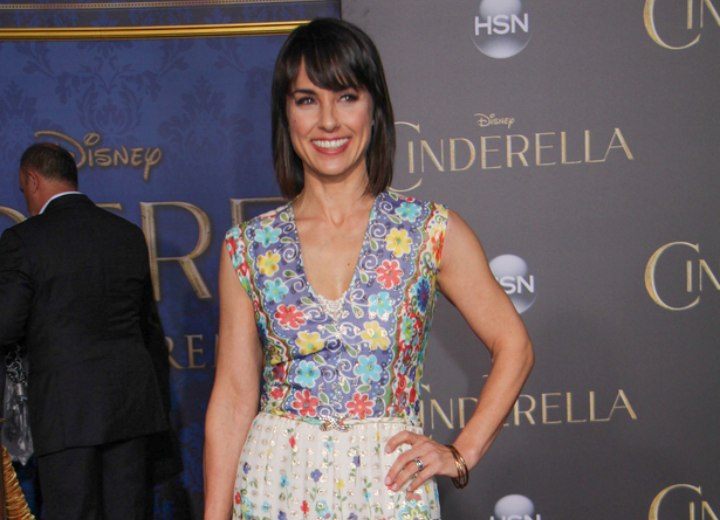 Constance Zimmer wearing a multicolored dress