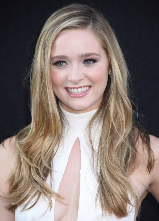 Greer Grammer with long and slightly wavy hair