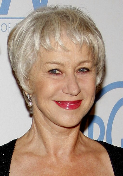 Helen Mirren wearing her silver white hair short in a pixie