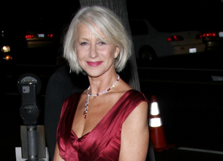 Helen Mirren wearing a dark red silk dress