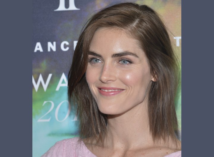 Hilary Rhoda | Medium length brown hair styled for a slightly messy and ...