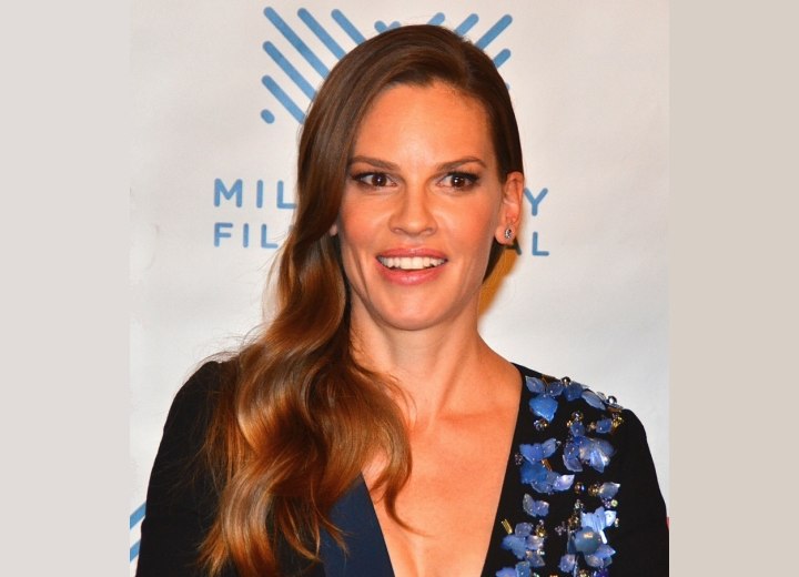 Hilary Swank with her hair styled to one side