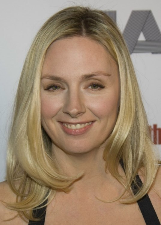 Hope Davis wearing her silky hair in shoulderlength style