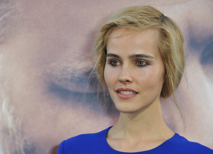 Isabel Lucas wearing her hair in a bob-like updo