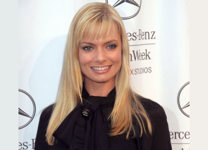 Jaime Pressly with long hair and bangs