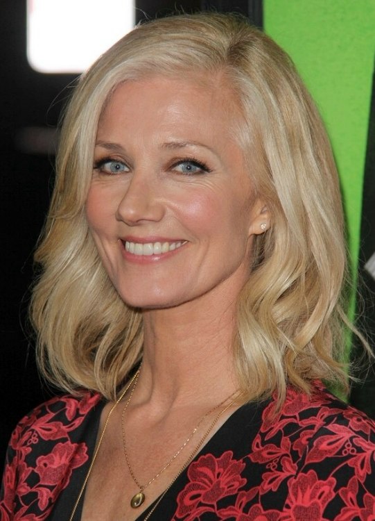 Joely Richardson  Shoulder-length hair curled in soft 