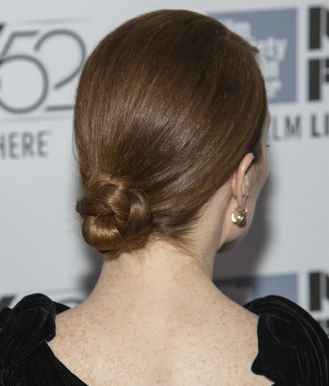 Julianne Moore wearing her sleek hair drawn back and 