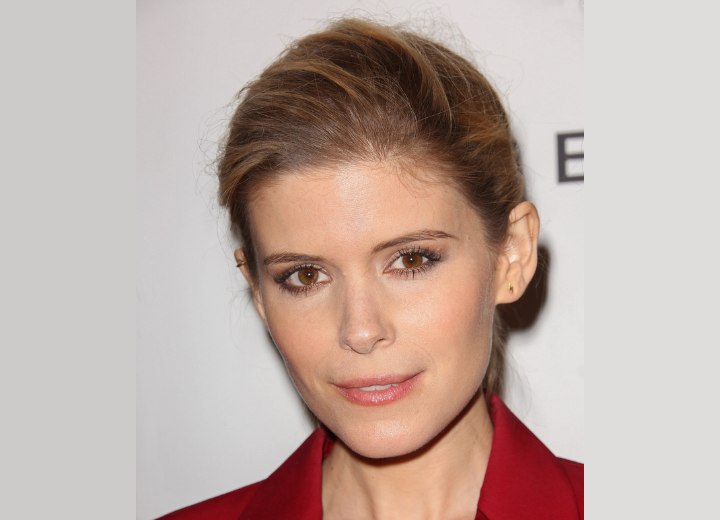Kate Mara with her hair up and off her shoulders