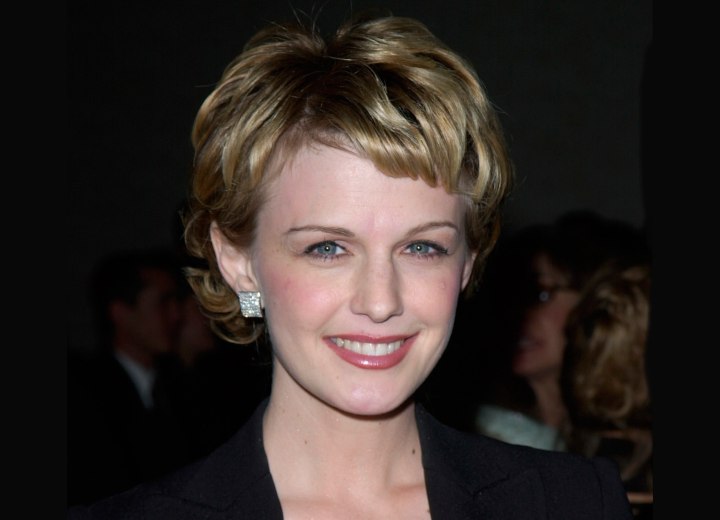 Kathryn Morris with her hair in a pixie