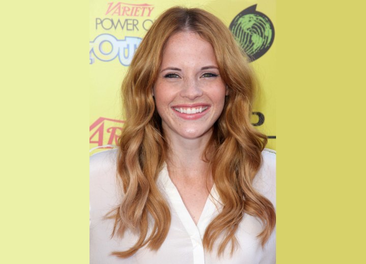 Katie Leclerc with long hair and beachy waves