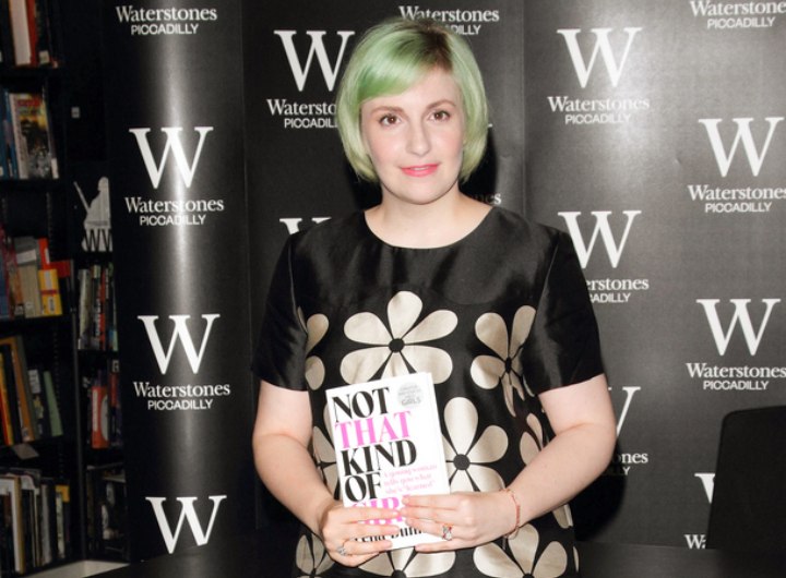 Lena Dunham wearing a large flower print dress