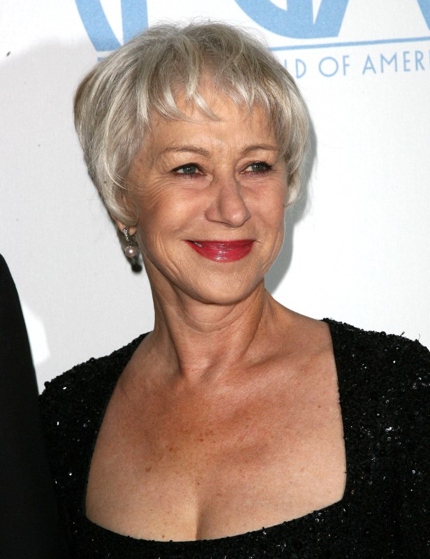 Helen Mirren wearing her silver white hair short in a pixie