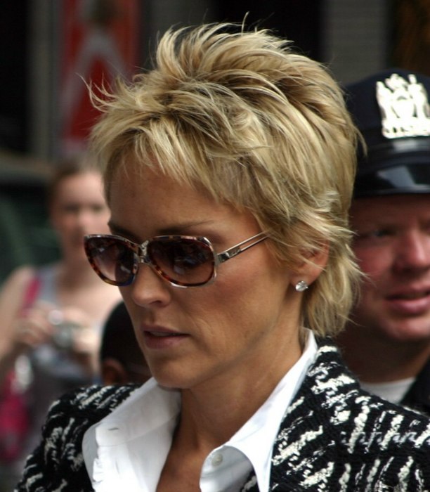 short haired sharon stone sporting an exuberant pixie