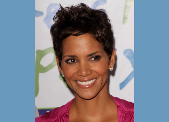 Halle Berry wearing her dark hair in a pixie