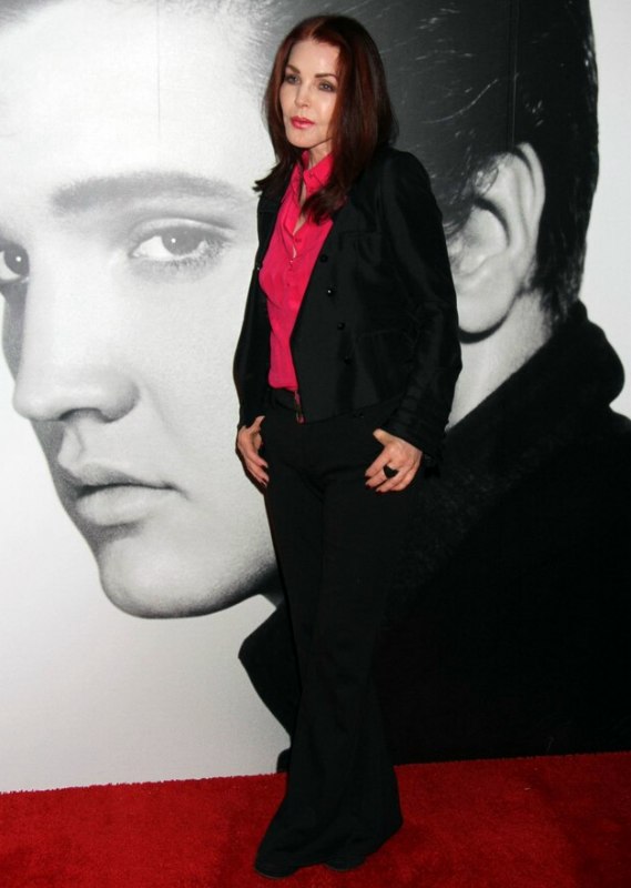 Priscilla Presley Naturally wave dark red hair for a 60 plus woman