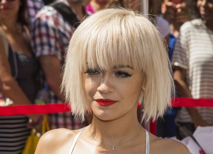 Rita Ora | Platinum blonde hair in a short bob with bangs