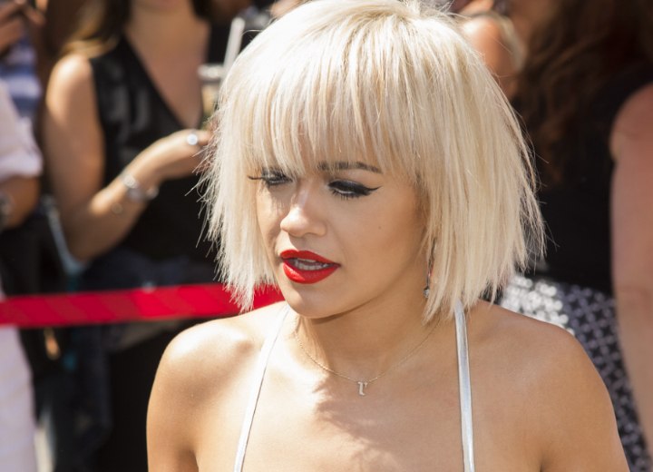 Rita Ora | Platinum blonde hair in a short bob with bangs