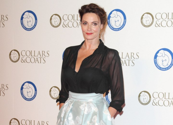 Sarah Parish wearing a sheer vintage blouse