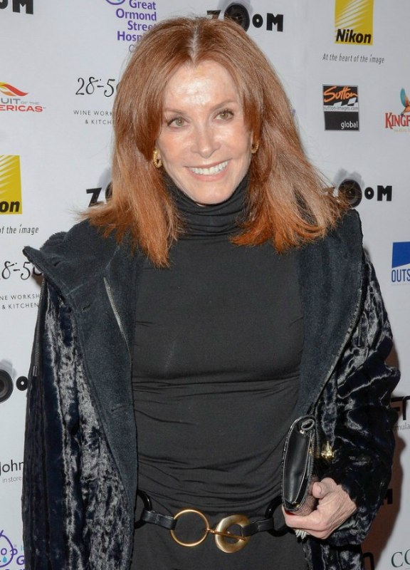Stefanie Powers  Hair and turtleneck giving a 70 plus 