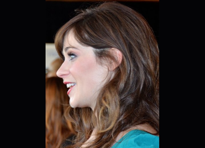 Zooey Deschanel's natural hair color with a contrast in shades