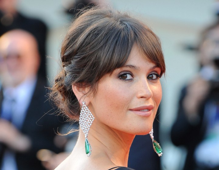 Gemma Arterton - Hair in an updo to show off earrings