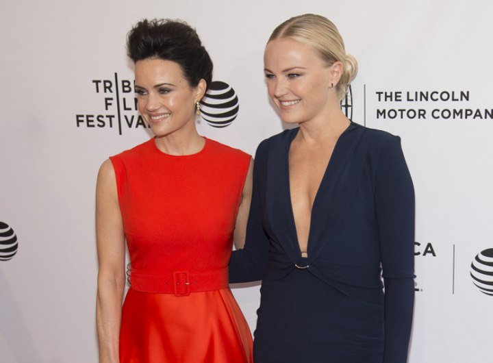 Malin Akerman and Carla Gugino with their hair styled to look short