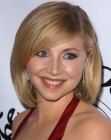 Sarah Chalke's medium long bob with a side part and a long fringe