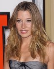 Sarah Roemer's long hairstyle with layers and lazy curls