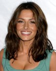 Sarah Shahi's blunt below the shoulders hair with a natural appeal