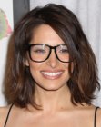 Sarah Shahi with her hair cut just above the shoulders