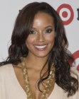 Selita Ebanks sporting long wavy hair with side bangs