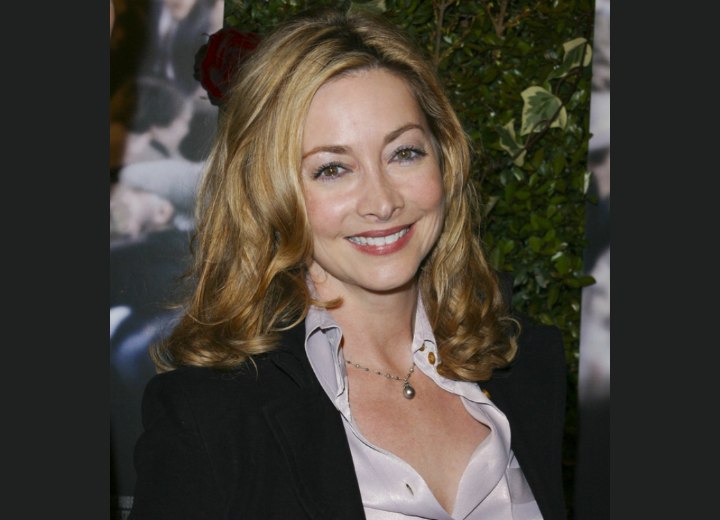 Sharon Lawrence wearing a silk shirt